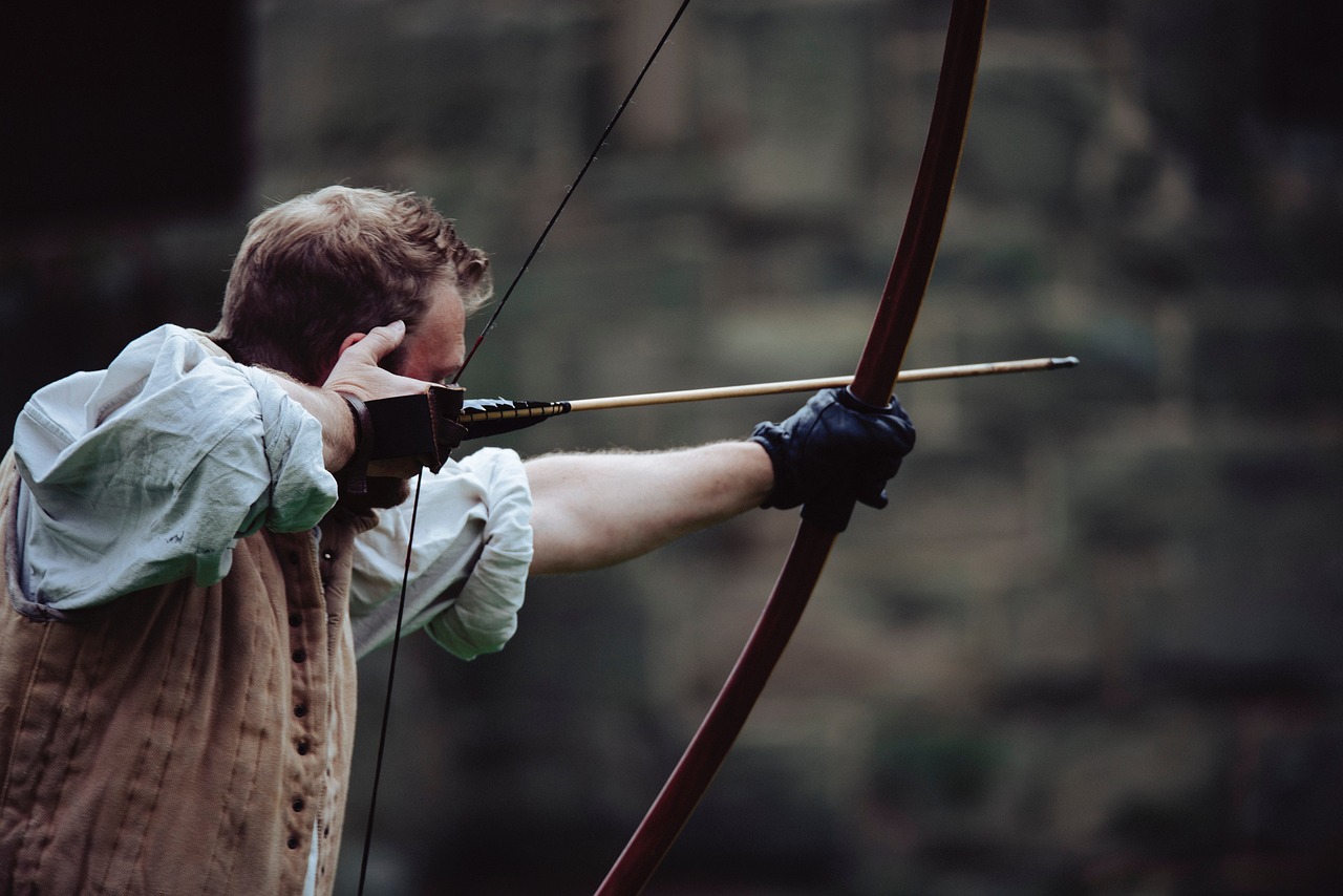 People, man, atlhlete, sport, game, adventure, outdoor, bow and arrow, gray arrow, gray gaming, gray sports, gray game, gray games