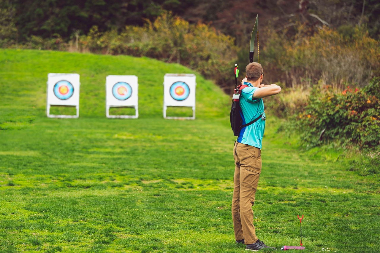 Archery, archer, delivering, arch, shoot, marksmanship, hits, target, objectives, arrow, sport, goal, aim, focus, game, hit, aiming, three, green arrow, green gaming, green sports, green game, green g