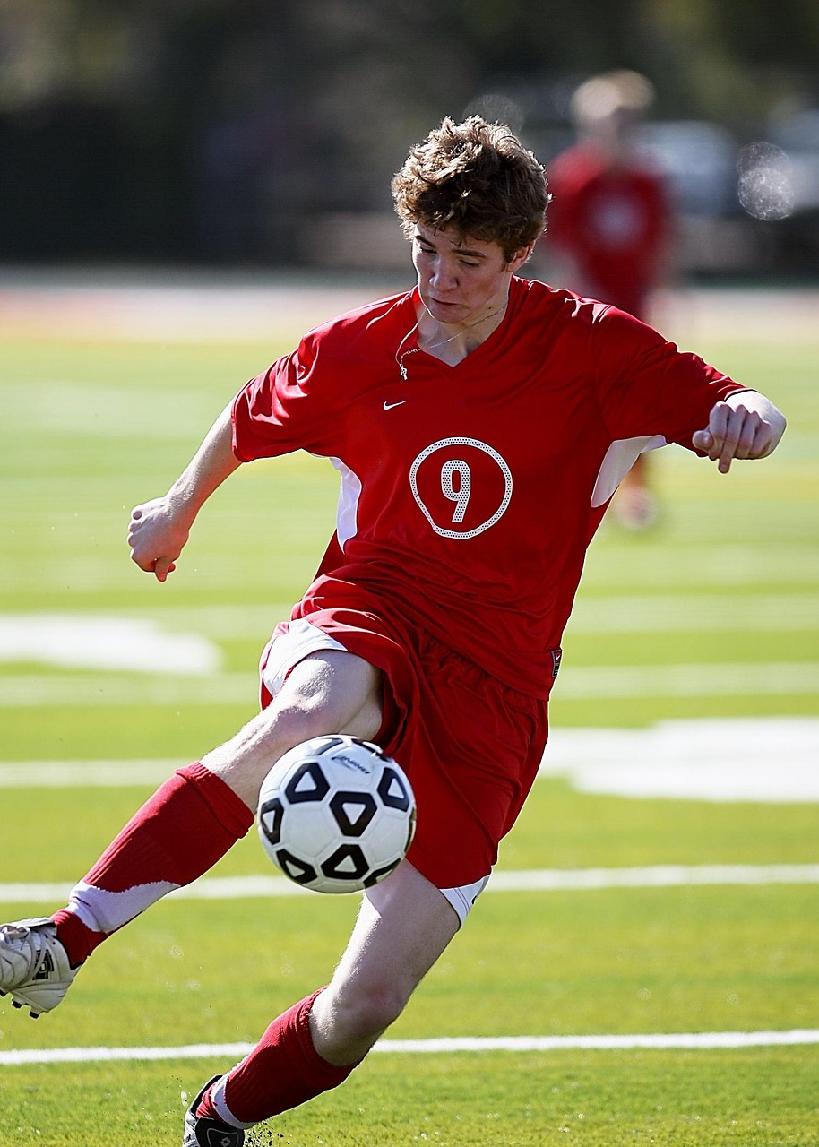 Soccer, football, soccer player, sport, ball, game, player, field, grass, boy, action, nature, soccer ball, sports balls, kicking, football player, school, soccer team, athlete, high school, green, re