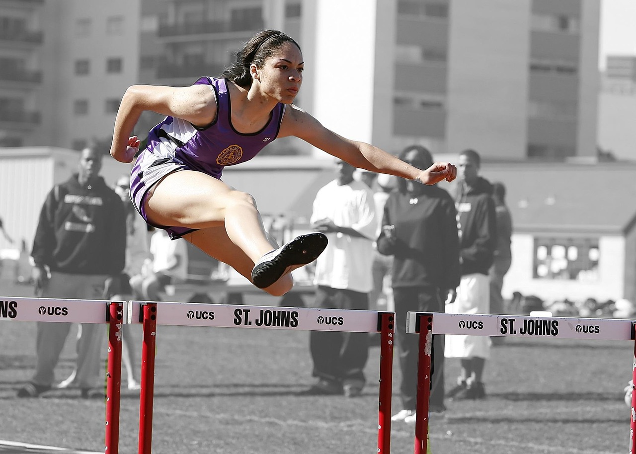 Hurdles, track, race, competition, running, obstacle, outdoors, athletic, challenge, athlete, athleticism, jumping, concentration, runner, sportswear, active, leaping, female, shoe, competitive, sport