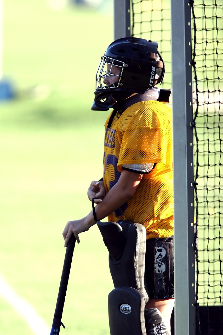 Field hockey, goalie, goal tender, net, helmet, stick, athlete, competition, equipment, game, goalkeeper, girls, female, glove, uniform, sport