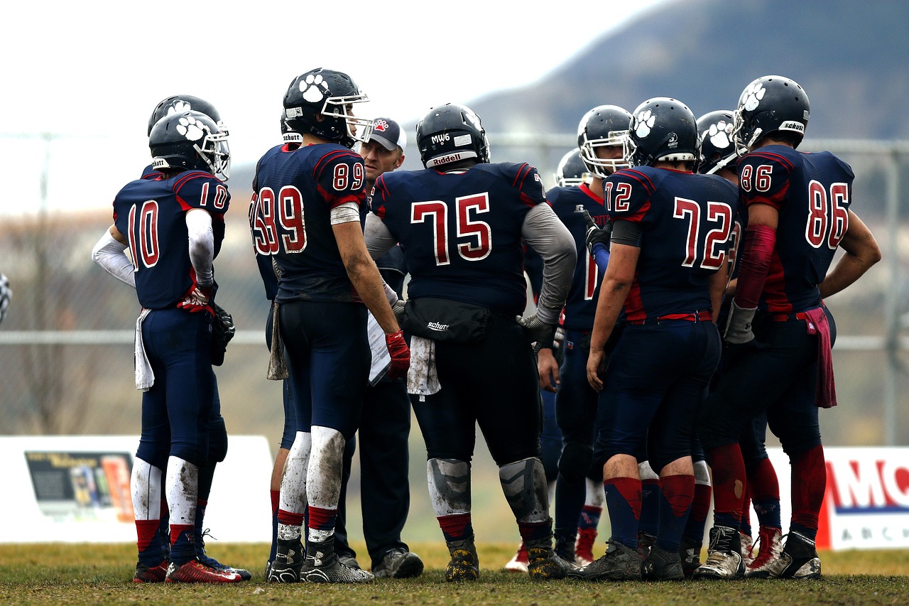 Football team, huddle, teamwork, athletes, coach, players, game, player, team, canadian, competition, action, football, football field, sport, american football, outdoors, canada, huddle, huddle, hudd