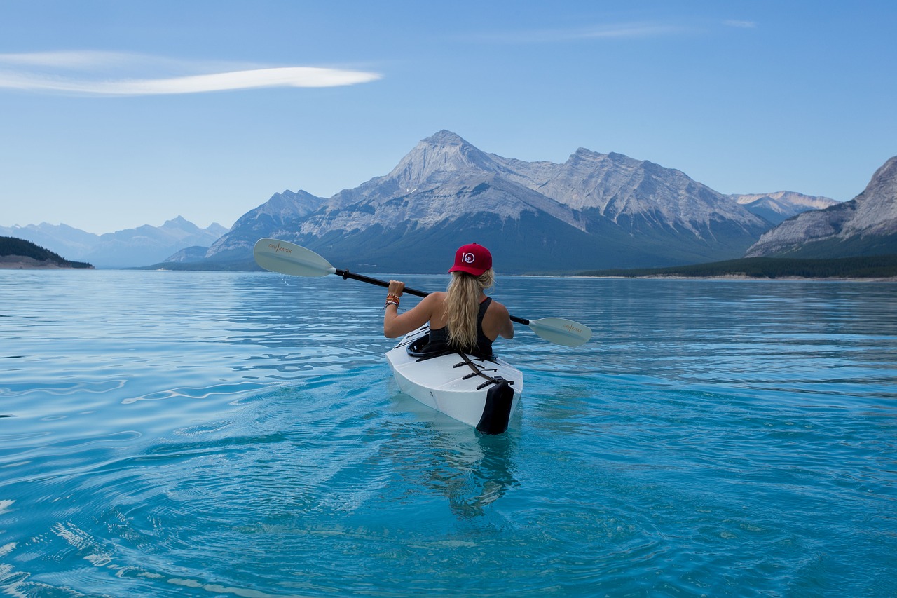 Girl, kayak, lake, canoe, kayaking, paddle, paddling, boat, alone, nature, adventure, active, water sports, woman, caucasian, blue water
