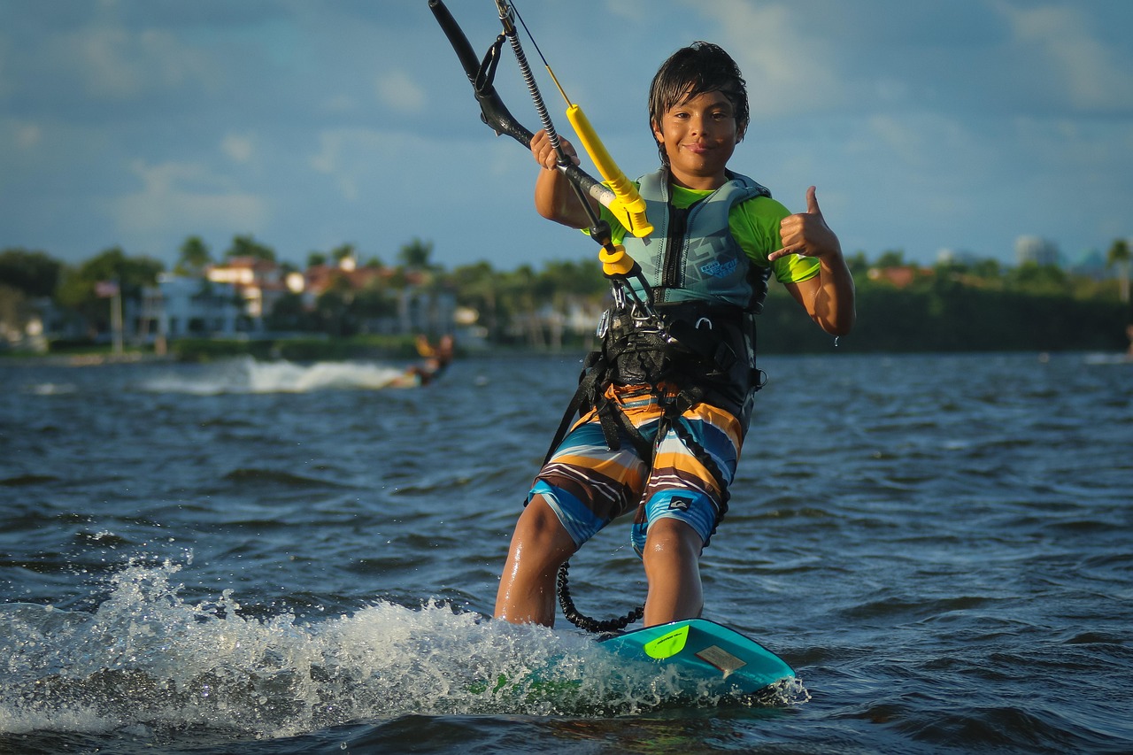Kitesurfing, kite boarding, beach, nature, ocean, kid, boy, blue board