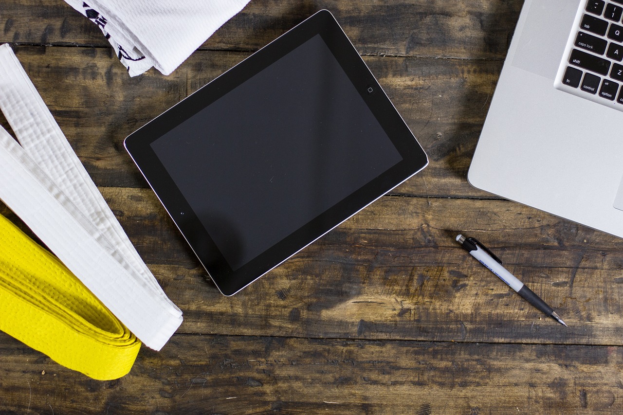 Karate, martial arts, computer, desk, marketing, market, social media, belt, black belt, white belt, karate belt, kung-fu, pen, tablet, mac, ipad, iphone, wood, rustic, cafe, coffee, shop, work, worki