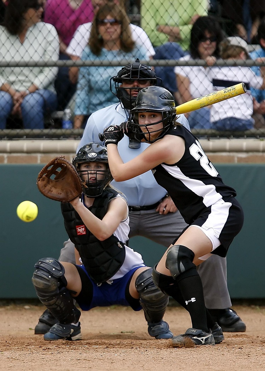 Softball, girls softball, action, high school, game, sport, female, batter, catcher, athlete, competition, fast pitch, batting, uniform, glove, catchers mitt, pitch, teen, umpire, strike zone, youth,