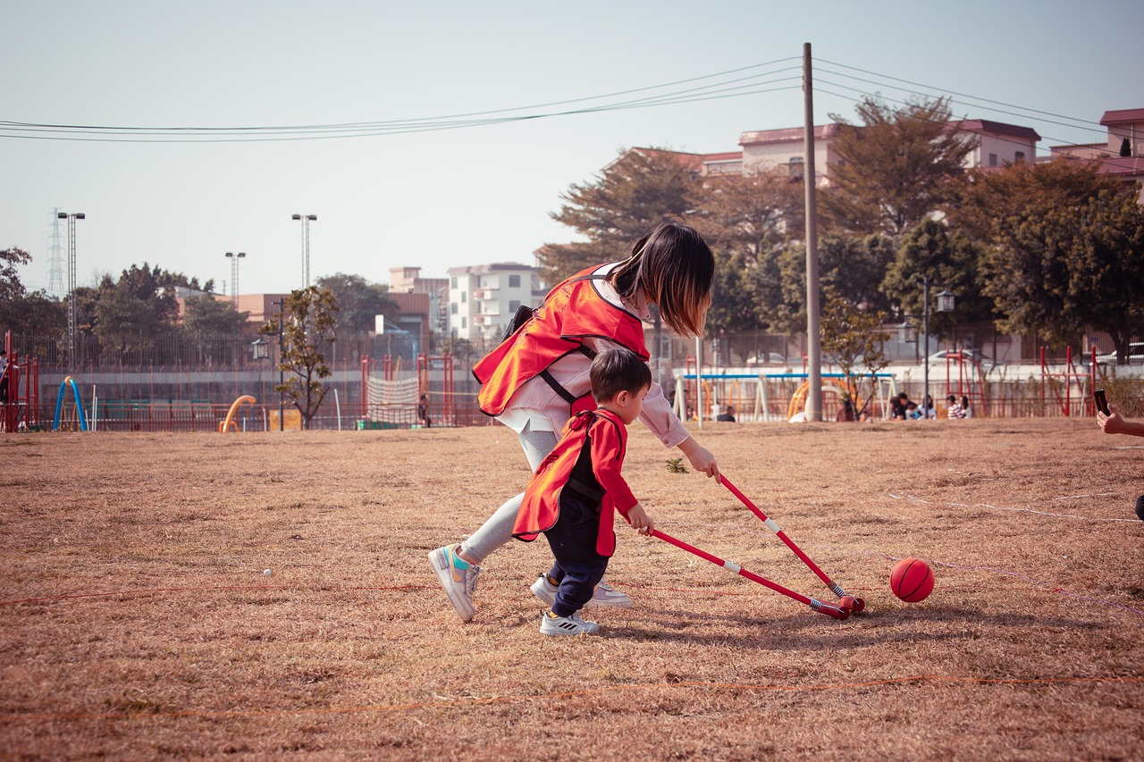 Child, parent, playing, field hockey, lawn, mother, son, boy, cute, kid, young, childhood, field hockey, field hockey, field hockey, field hockey, field hockey